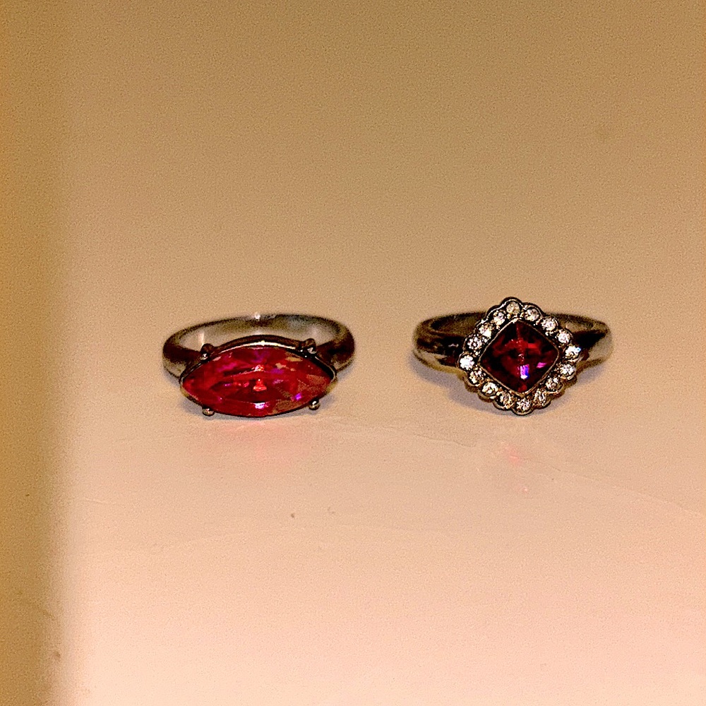 Set of two rings with accent stones.
